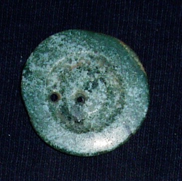 Greenstone button